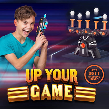 Boy holding the dart blaster next to the floating target game, up to 25 ft shooting range